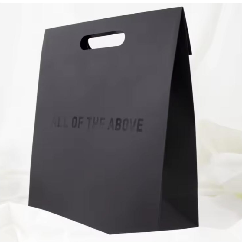 Luxus-Stempelgriff Griff schwarzer Kleidung Einkaufsverpackung Papiertüum Schmuck Kosmetik Custom Logo Packing Design Paper Geschenkstücke